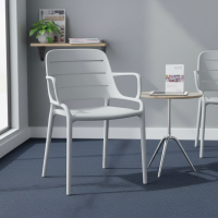 Stackable outdoor chair in polypropylene Helda with armrests