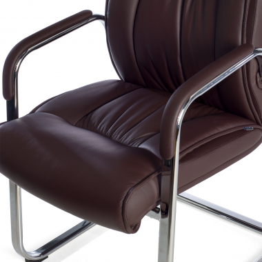 visitor chair brown sled base natural leather natural skin upholstered armrests 7