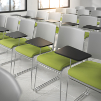 Upholstered chair Hest with writing tablet